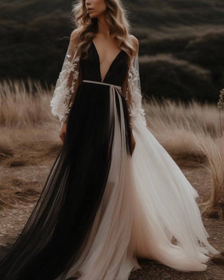 Black and white wedding dress by Atelier Calliste featuring elegant design and intricate details for special occasions.