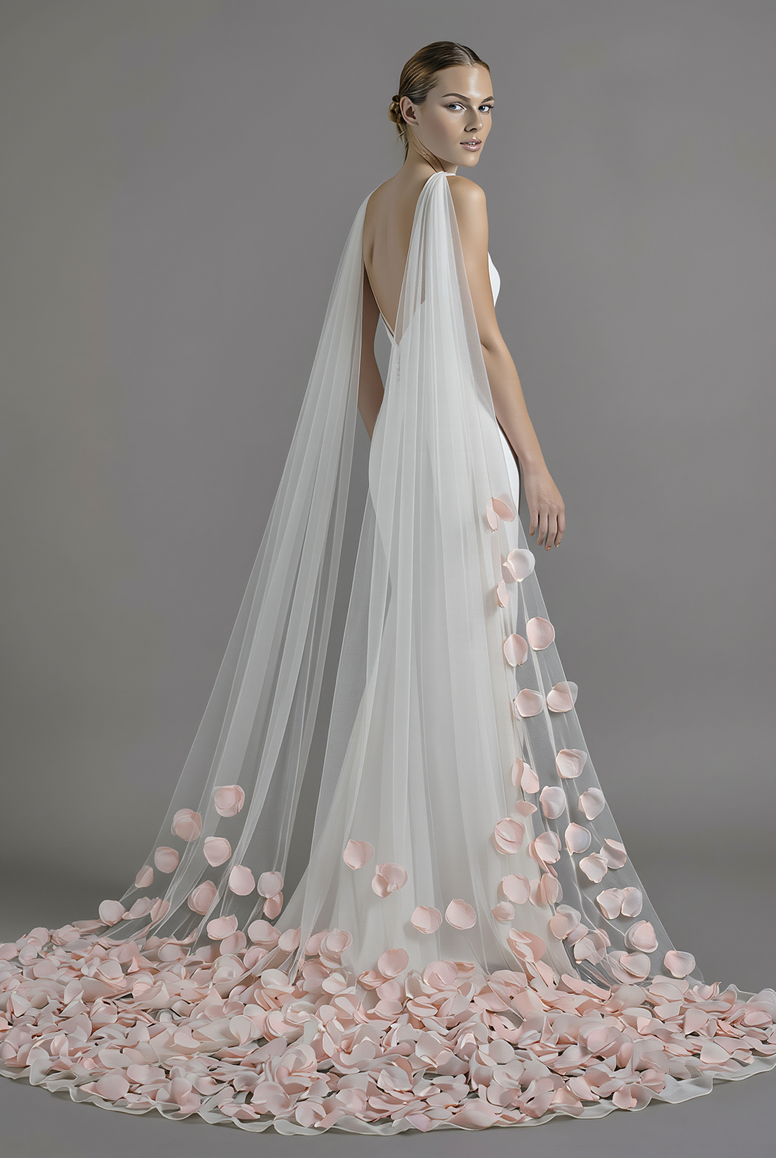 Atelier Calliste 3D Flowers veil with low petals, delicate floral design, transparent tulle fabric, perfect for bridal or special occasions.