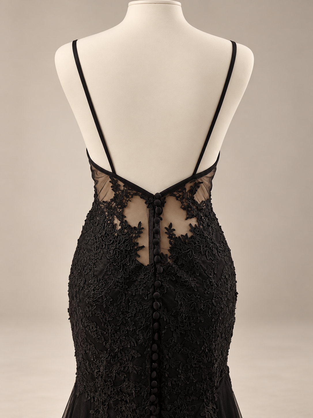 Petra Kara Bridal black wedding evening dress with elegant design, fitted silhouette, and long flowing skirt for formal occasions.