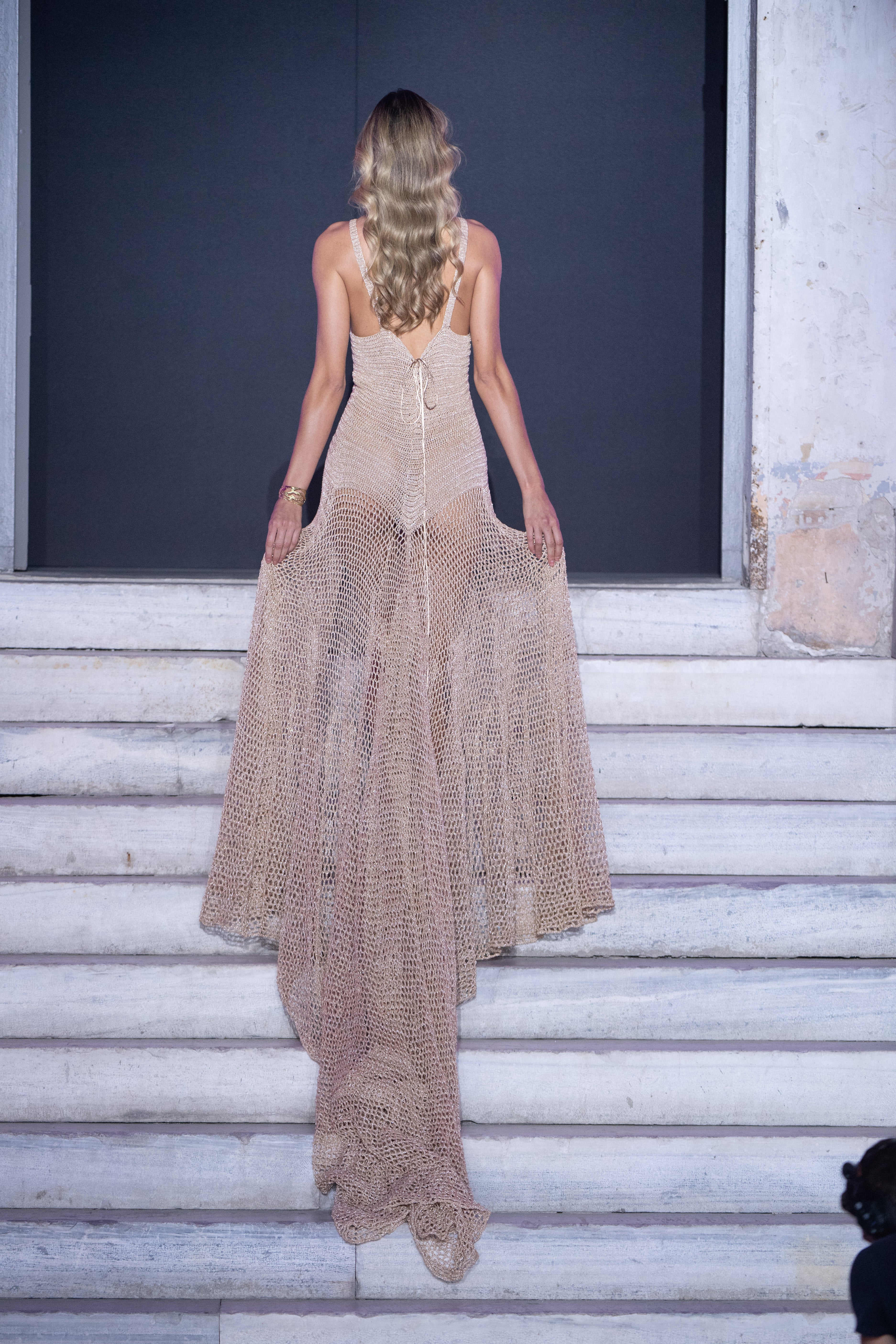 Elegant gold crochet dress by PETRA KARA for special occasions, featuring intricate design and stylish fit.