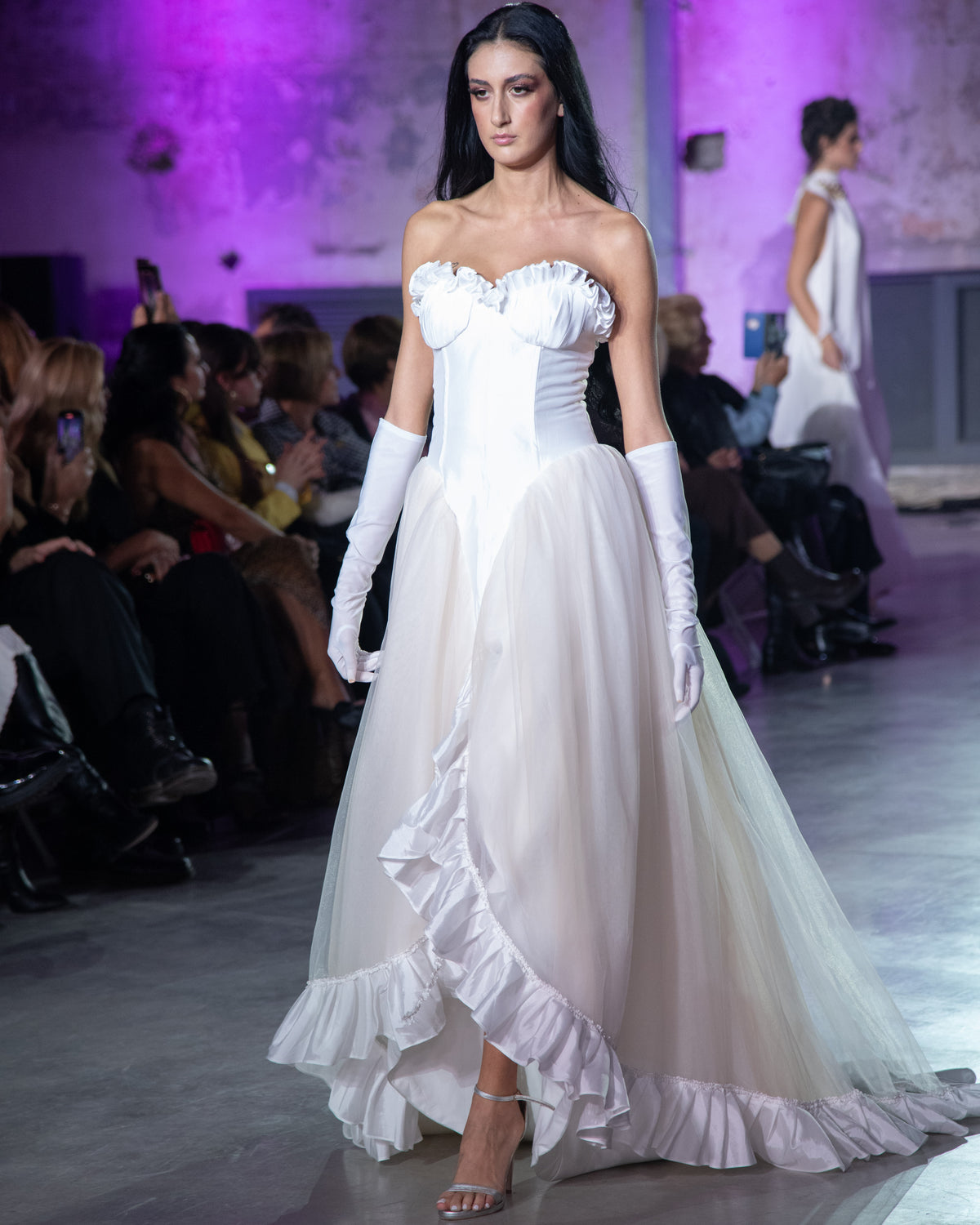 Petra Kara The Dreamer Dress displayed on a hanger, showcasing its elegant fabric and stylish design.