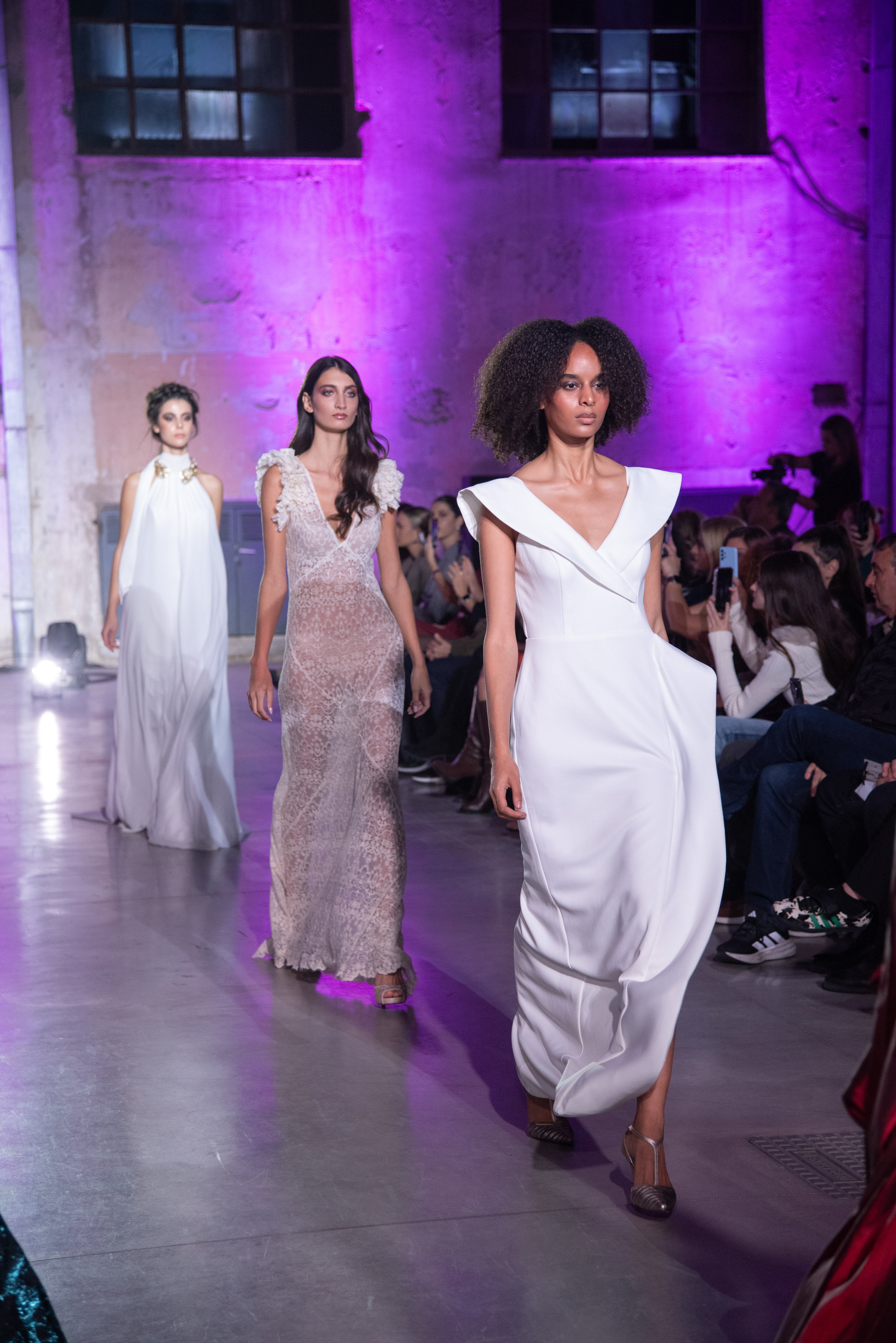 Petra Kara Aegean Architectural Dress displayed on a mannequin, showcasing its intricate design and flowing fabric.
