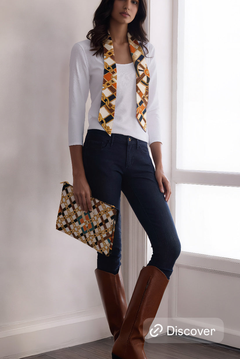 Leather purse from Petra Kara Revolution Limited Collection with chain details, featuring black leather and stylish design.