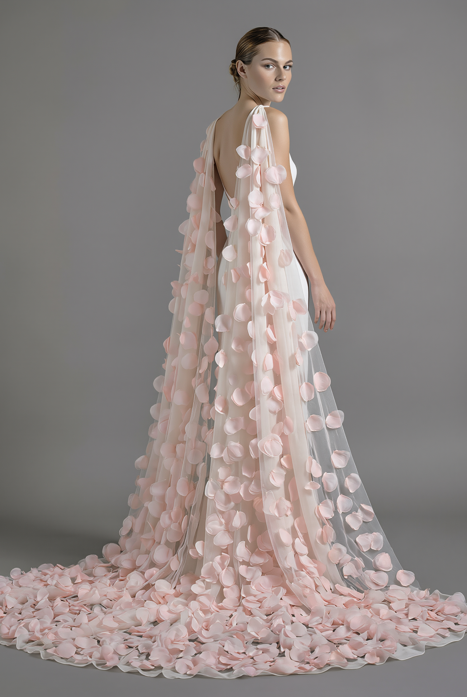 Delicate 3D flowers veil by Atelier Calliste with intricate floral lace design for elegant bridal or special occasion wear.