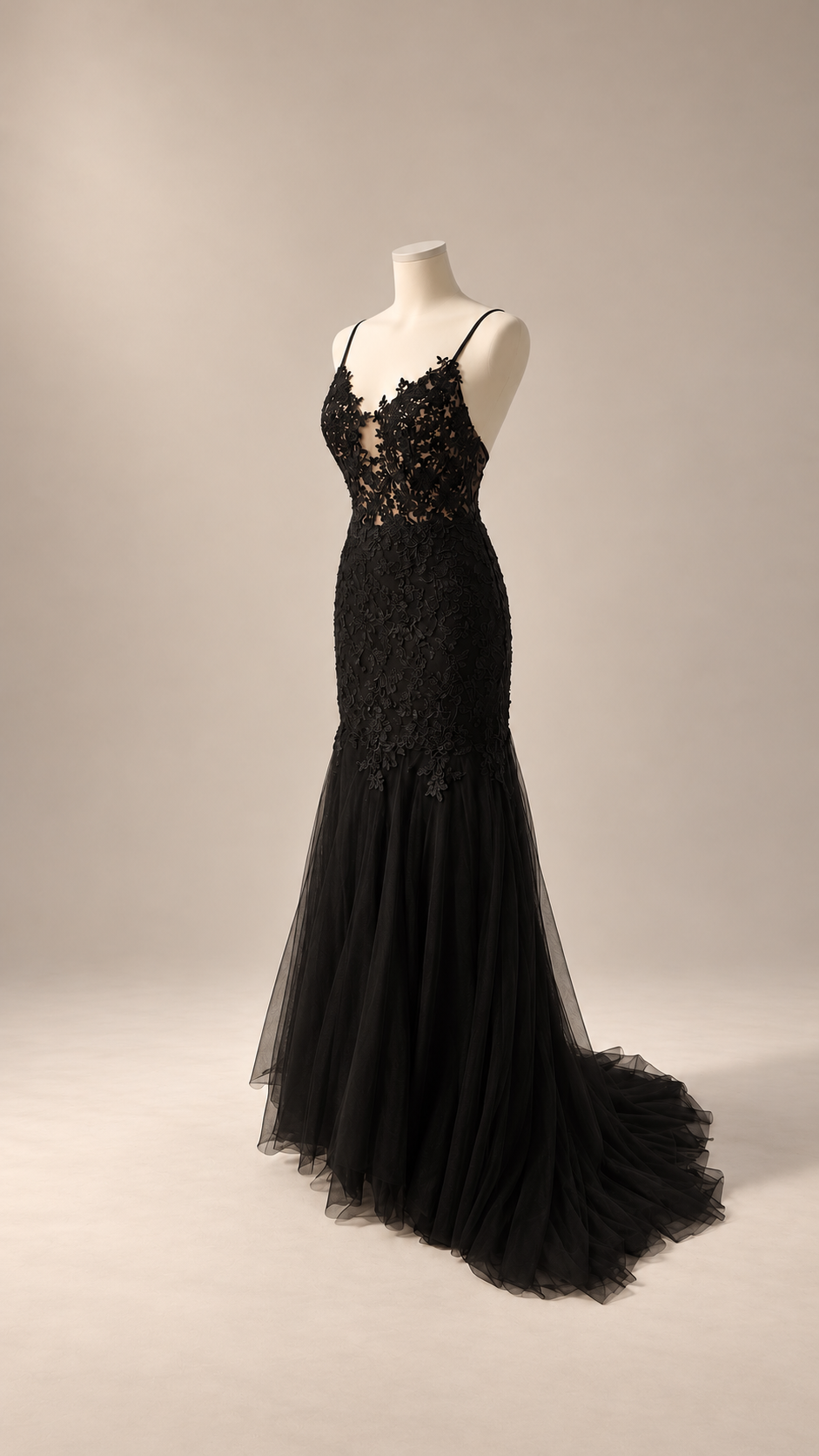 Petra Kara Bridal witch black wedding evening dress with elegant flowing fabric and intricate detailing on the bodice.