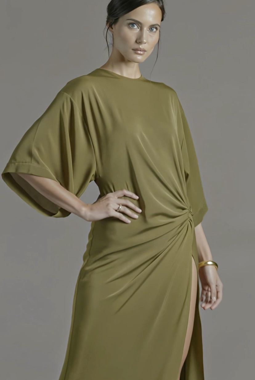 Petra Kara Minimal Ekati Draped Dress in neutral fabric, showcasing elegant draping and a sleek, minimalist design.