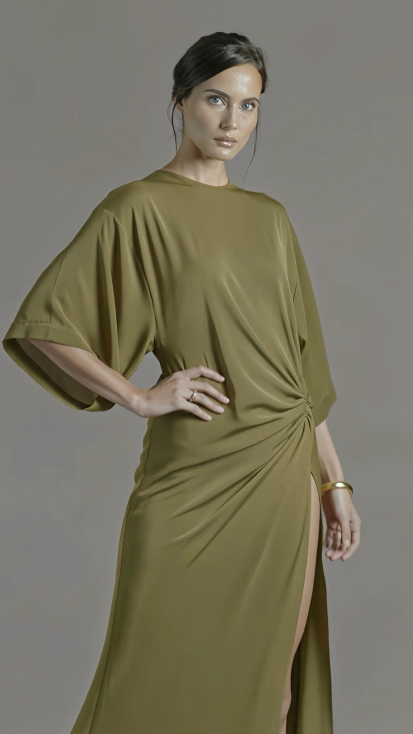 Petra Kara Minimal Ekati Draped Dress in neutral fabric, showcasing elegant draping and a sleek, minimalist design.