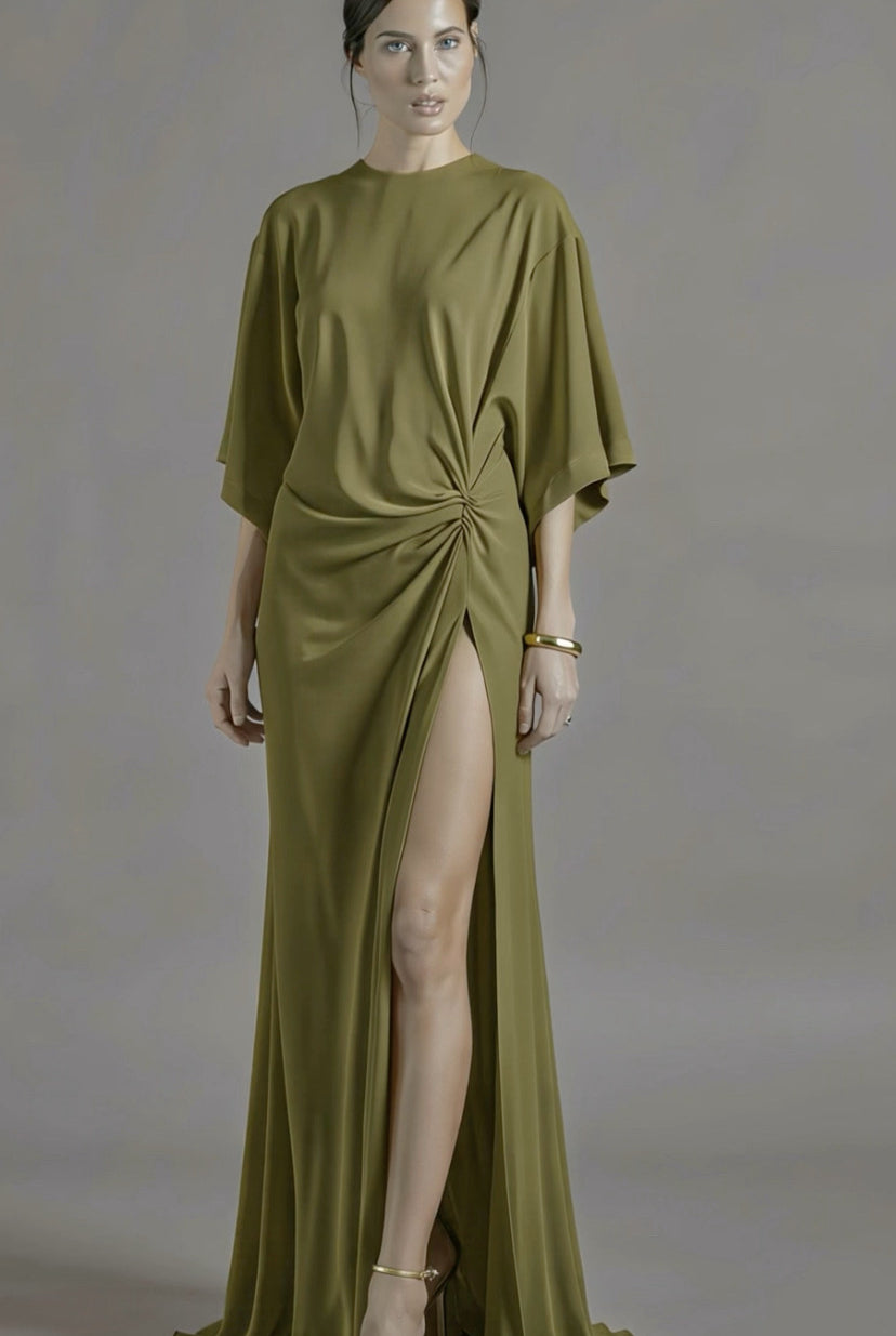 Petra Kara Minimal Ekati Draped Dress shown on a hanger, featuring elegant draped fabric and a sleek, minimalist design.