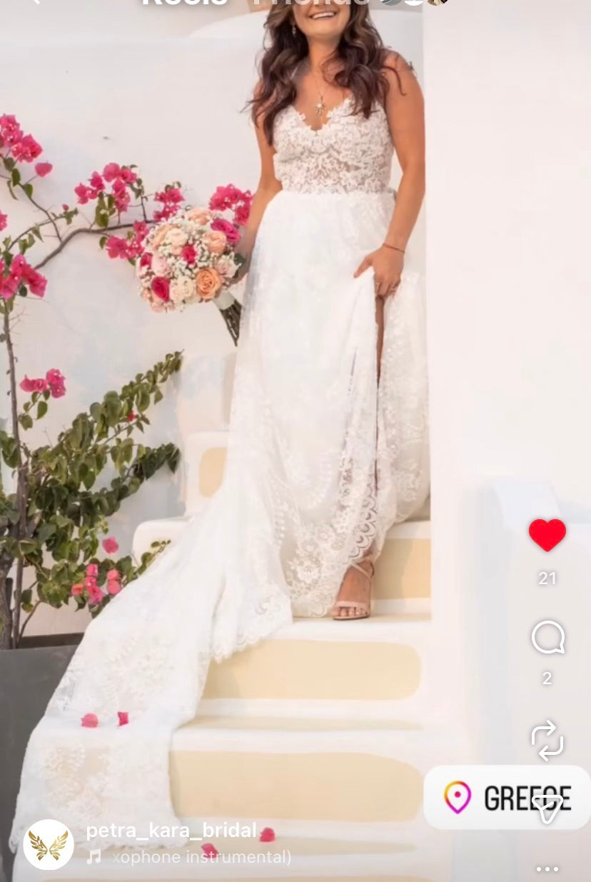 Boho wedding dress by Atelier Calliste featuring flowing fabric, intricate lace details, and a relaxed bridal style.