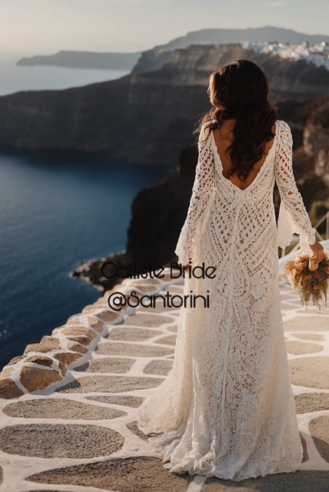 Hippie Calliste crochet boho wedding dress by Petra Kara Bridal, featuring intricate lace details and flowing silhouette.