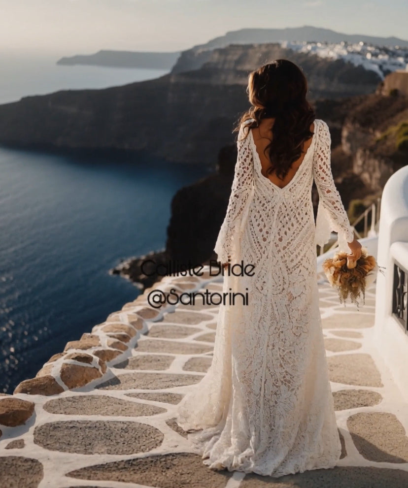 Hippie Calliste crochet boho wedding dress by Petra Kara Bridal, featuring intricate lace details and flowing silhouette.