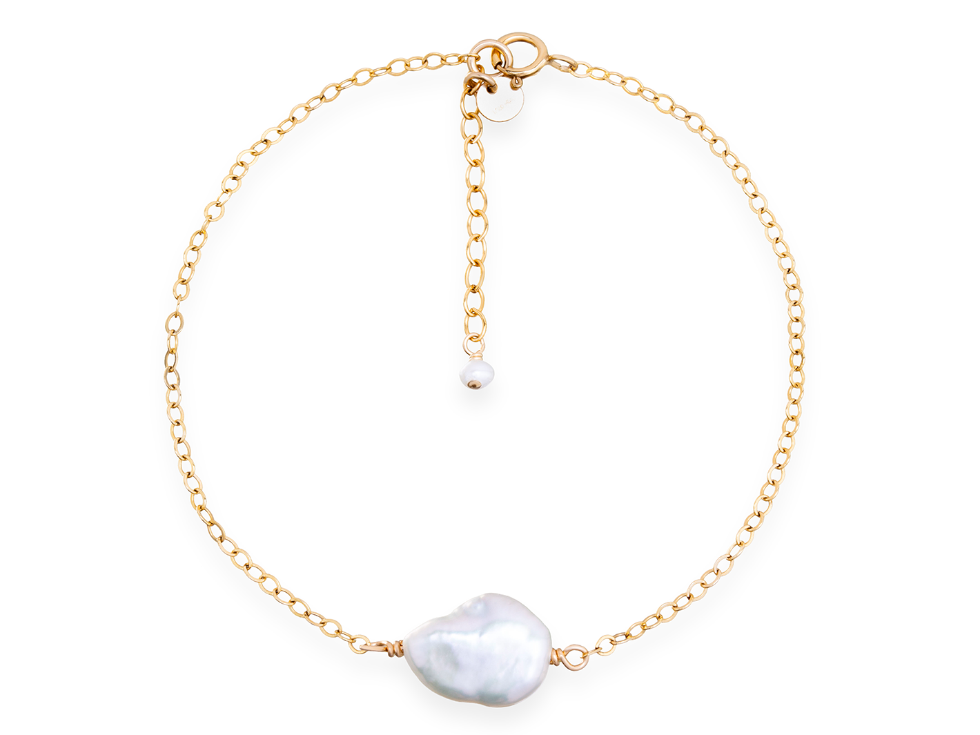 A single gold Alyssa Keishi Pearl bracelet by PM Atelier featuring elegant white pearls on a delicate chain.