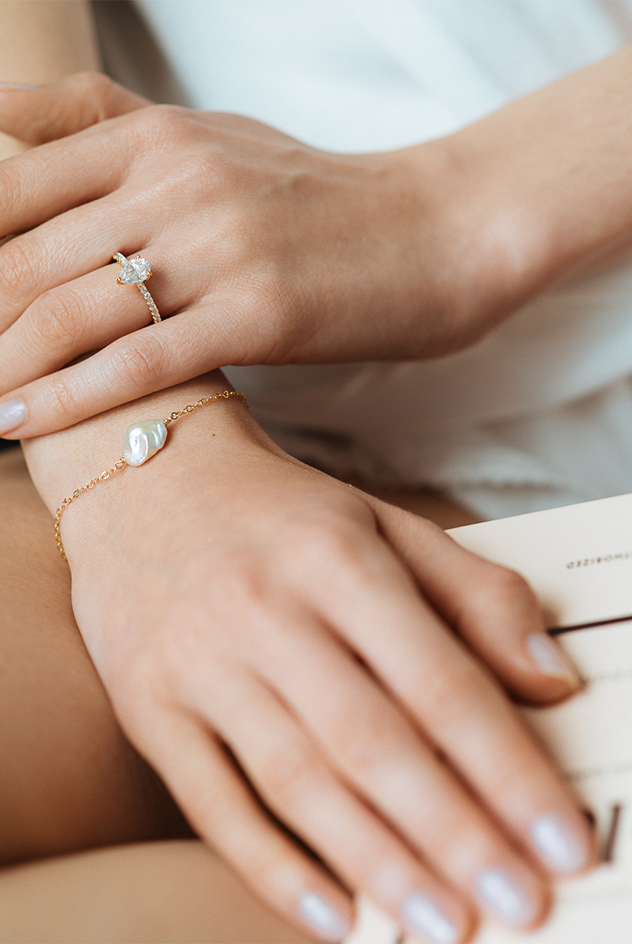 Alyssa single Keishi pearl bracelet by PM Atelier featuring a delicate string of lustrous white pearls on a sleek bracelet.