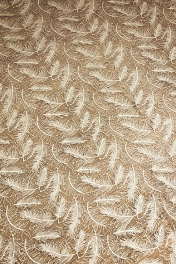 Feather veil and cape from Atelier Calliste, featuring delicate feathers and flowing fabric for elegant costume or fashion wear.