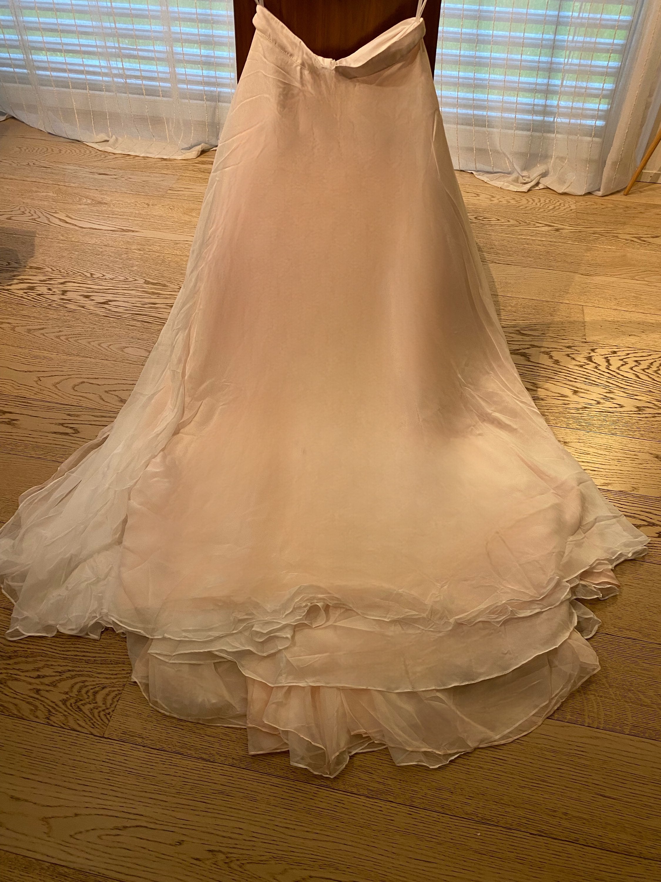 Whimsical boho romantic wedding skirt by Petra Kara Bridal in sizes S to XXXXL, featuring flowing fabric and delicate details.