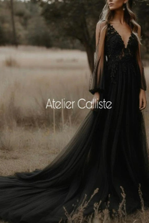 Petra Kara Bridal Atropos Black wedding dress featuring elegant fabric and a fitted silhouette for a sophisticated bridal look.