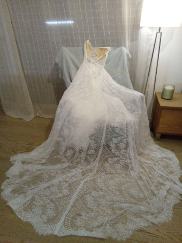 Atelier Calliste boho wedding dress with flowing fabric and intricate lace details, perfect for a romantic bridal look.