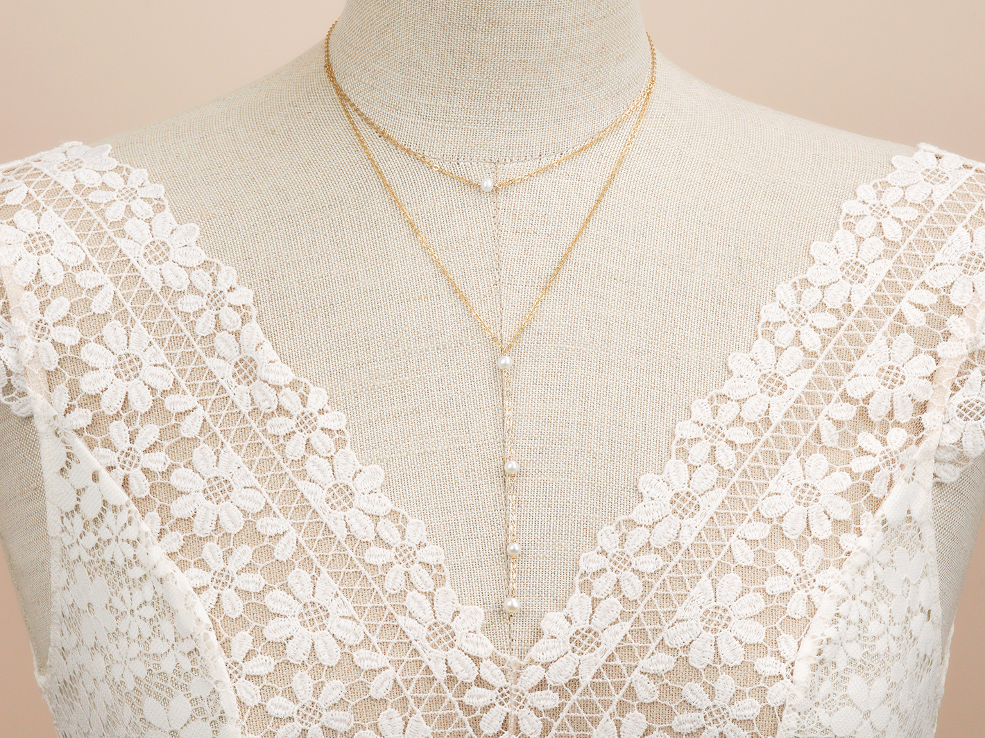 Elegant bridal layered Y necklace by PM Atelier featuring double-layered freshwater pearls for a sophisticated wedding look.