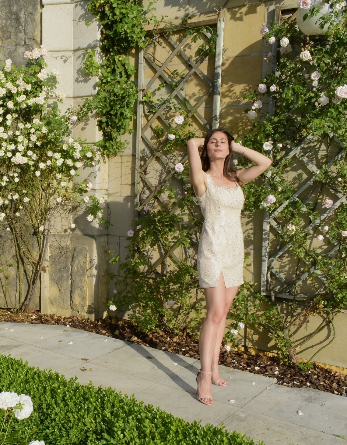 Pink Rose beaded dress by Atelier Calliste featuring intricate beadwork and a flowing silhouette.