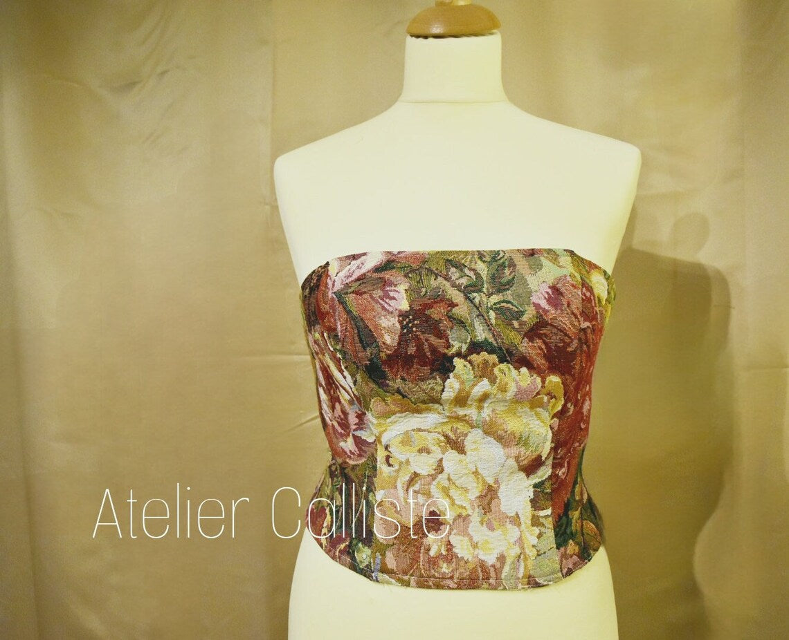 Flower Blossom oil painting top in size S-XXL by Atelier Calliste, featuring vibrant floral artwork on a fabric top.