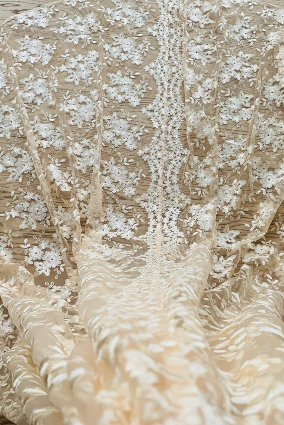 Elegant dramatic lace cape from PETRA KARA BRIDAL in size S-XXXL, showcasing intricate lace details and flowing fabric.