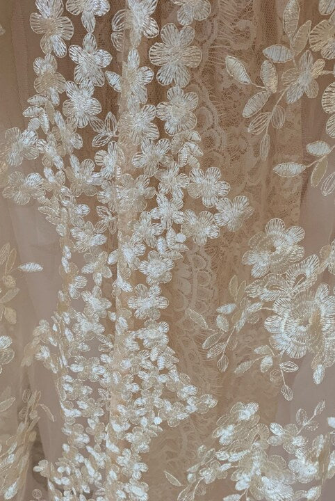 Petra Kara Bridal dramatic lace cape in S-XXXL, showcasing intricate lace details and flowing fabric for elegant bridal wear
