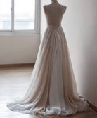 Whimsical boho romantic wedding skirt by Petra Kara Bridal in soft fabric with flowing design and intricate lace details.