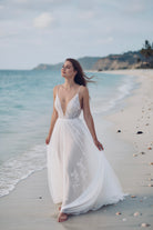 Ethereal Boho beach dress by Petra Kara Bridal featuring flowing fabric and bohemian style for seaside or casual wear.