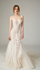 Digital image showing PETRA KARA's free virtual dress consultation service, featuring a laptop and fashion styling visuals.