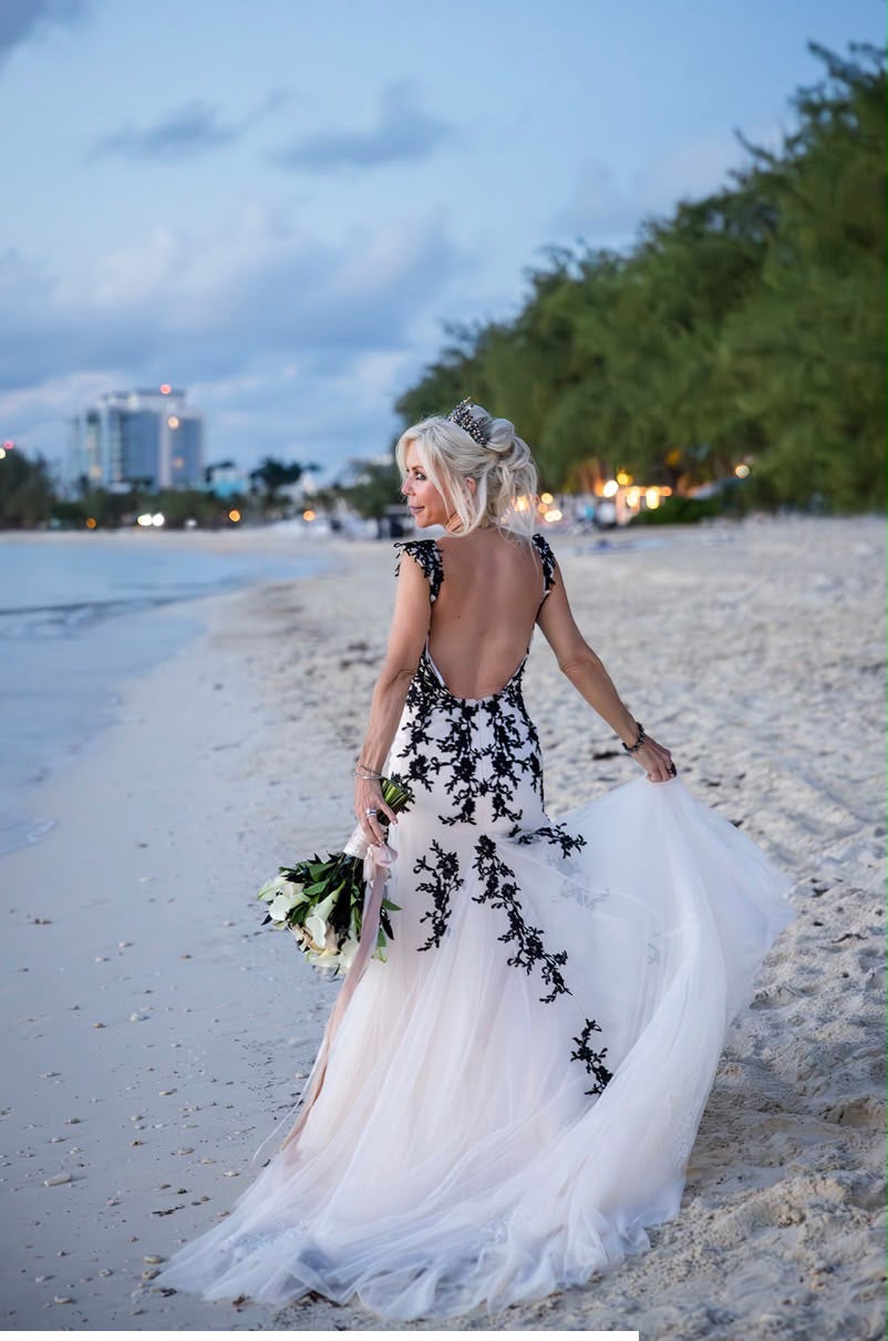 Ethereal Mystique Nymph wedding dress by Atelier Calliste featuring flowing fabric and delicate lace details.