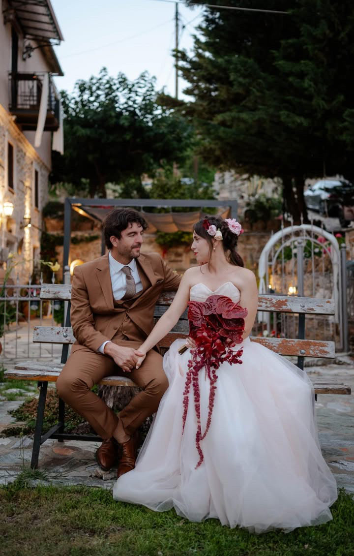 PETRA KARA BRIDAL architectural corset blush peach wedding dress with structured bodice and elegant bridal silhouette