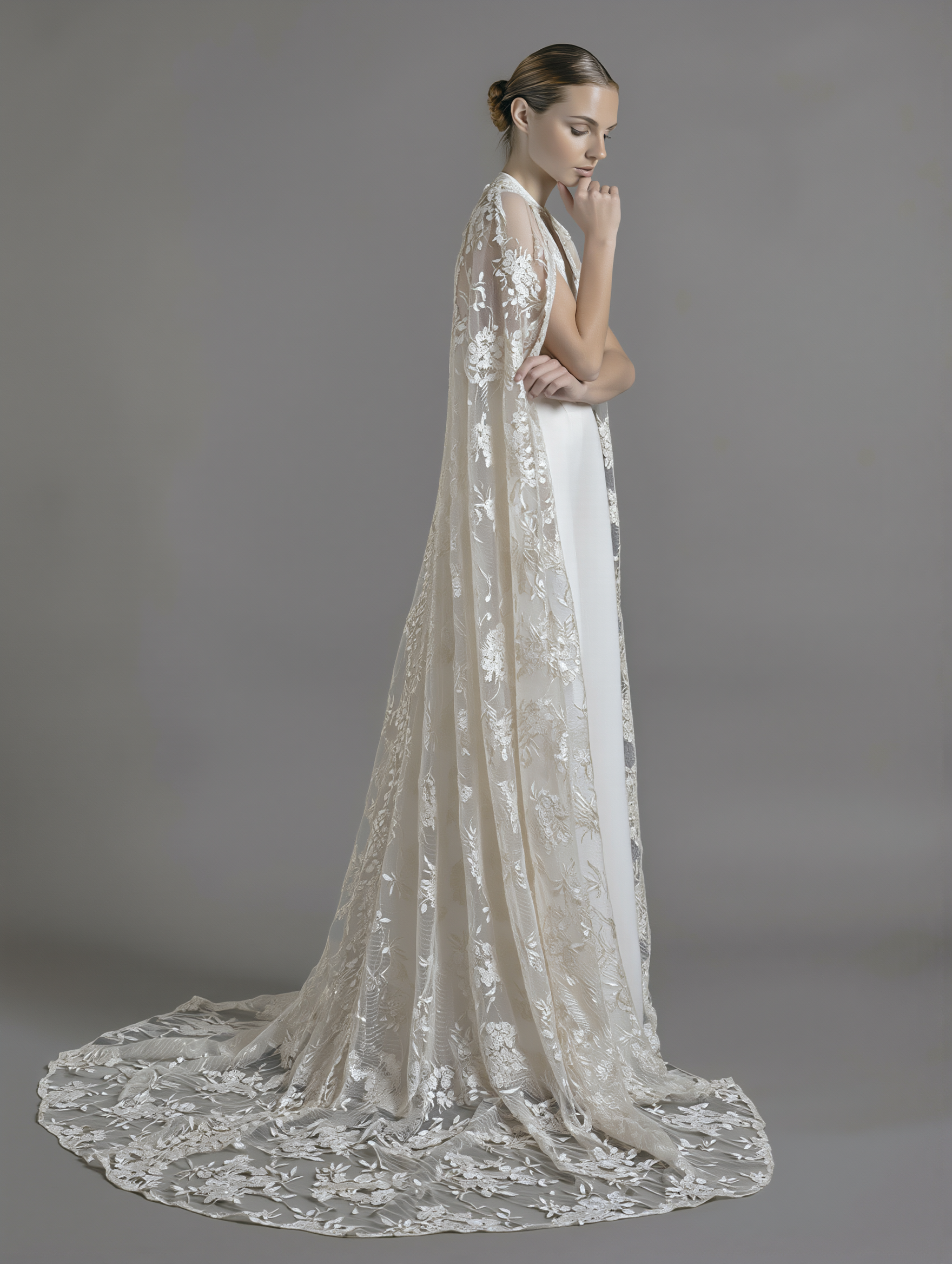 Petra Kara Bridal dramatic lace cape in size S-XXXL, featuring intricate lace details and flowing design.