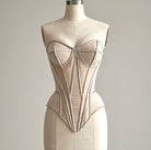 PETRA KARA architectural corset shown on a mannequin, featuring intricate design and structured fit for fashion and design purposes.