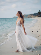 Ethereal Boho beach dress by Petra Kara Bridal featuring flowing fabric and bohemian style for summer beachwear.