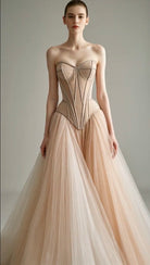 Petra Kara architectural corset dress featuring structured design and intricate details, worn by a model.