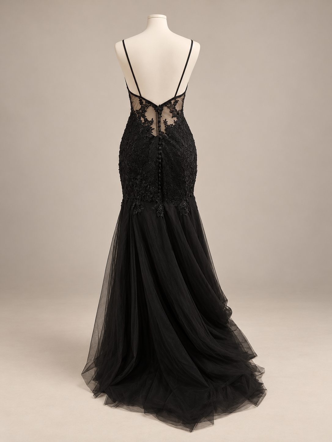 Elegant black wedding evening dress by Petra Kara Bridal featuring a fitted silhouette and intricate details.