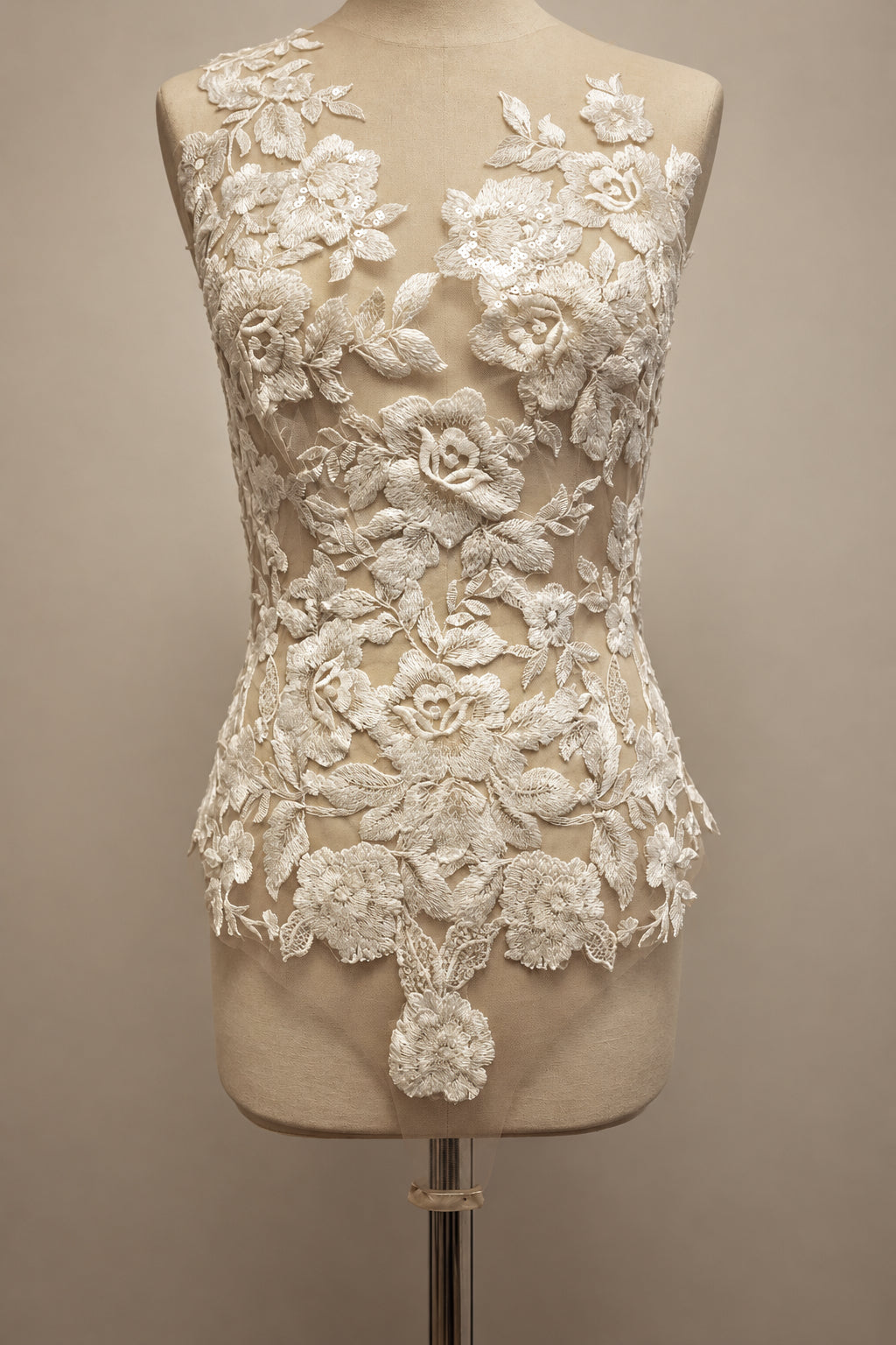 Mythic Nymph bridal bodysuit top by PETRA KARA, featuring delicate lace and elegant floral details on a white sheer fabric.