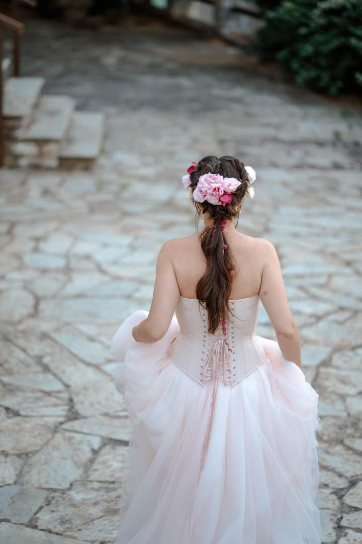 PETRA KARA BRIDAL blush peach architectural corset wedding dress with structured bodice and elegant silhouette