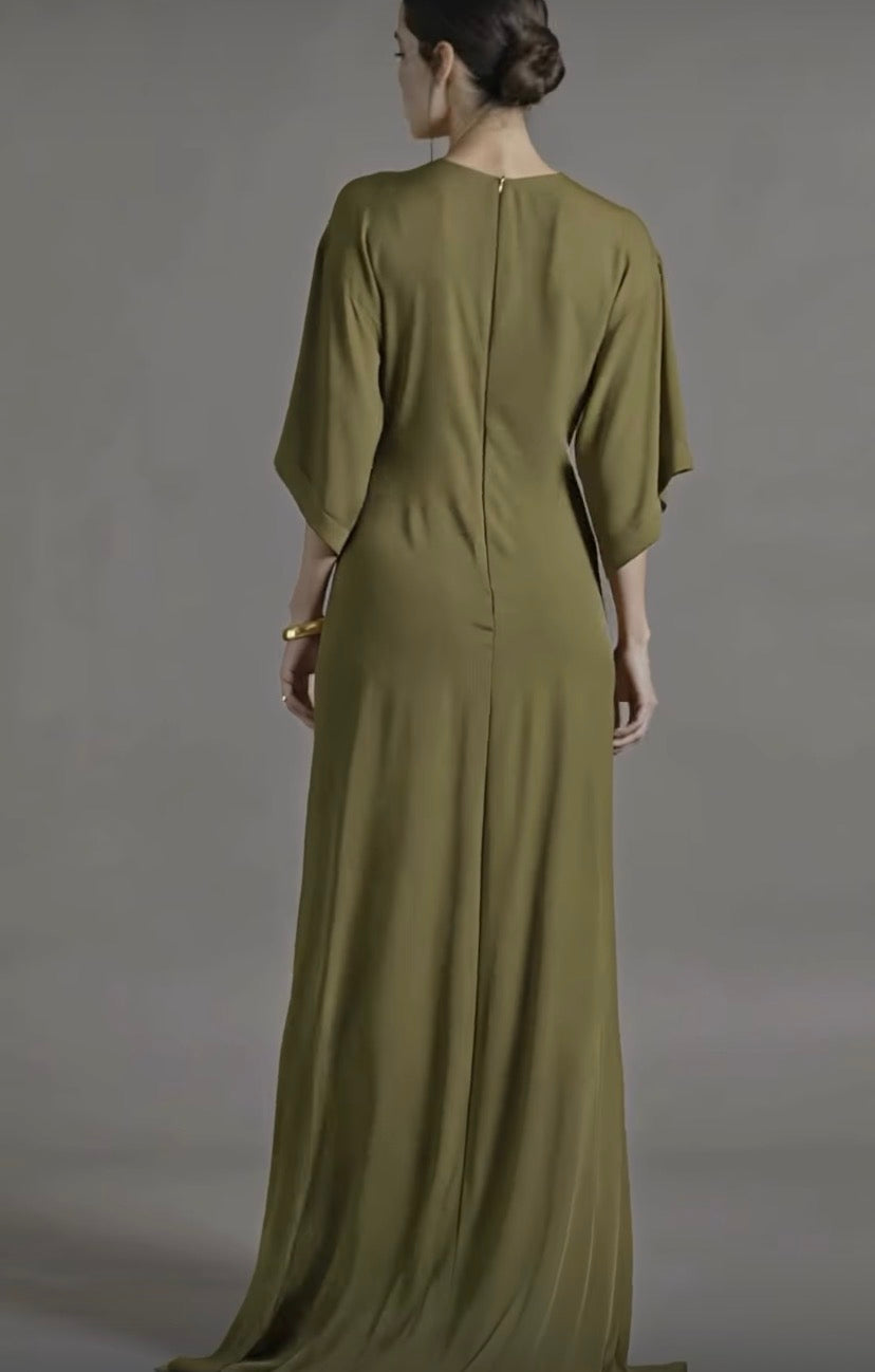Petra Kara Minimal Ekati Draped Dress displayed on a mannequin, showcasing its elegant draped design and soft fabric.
