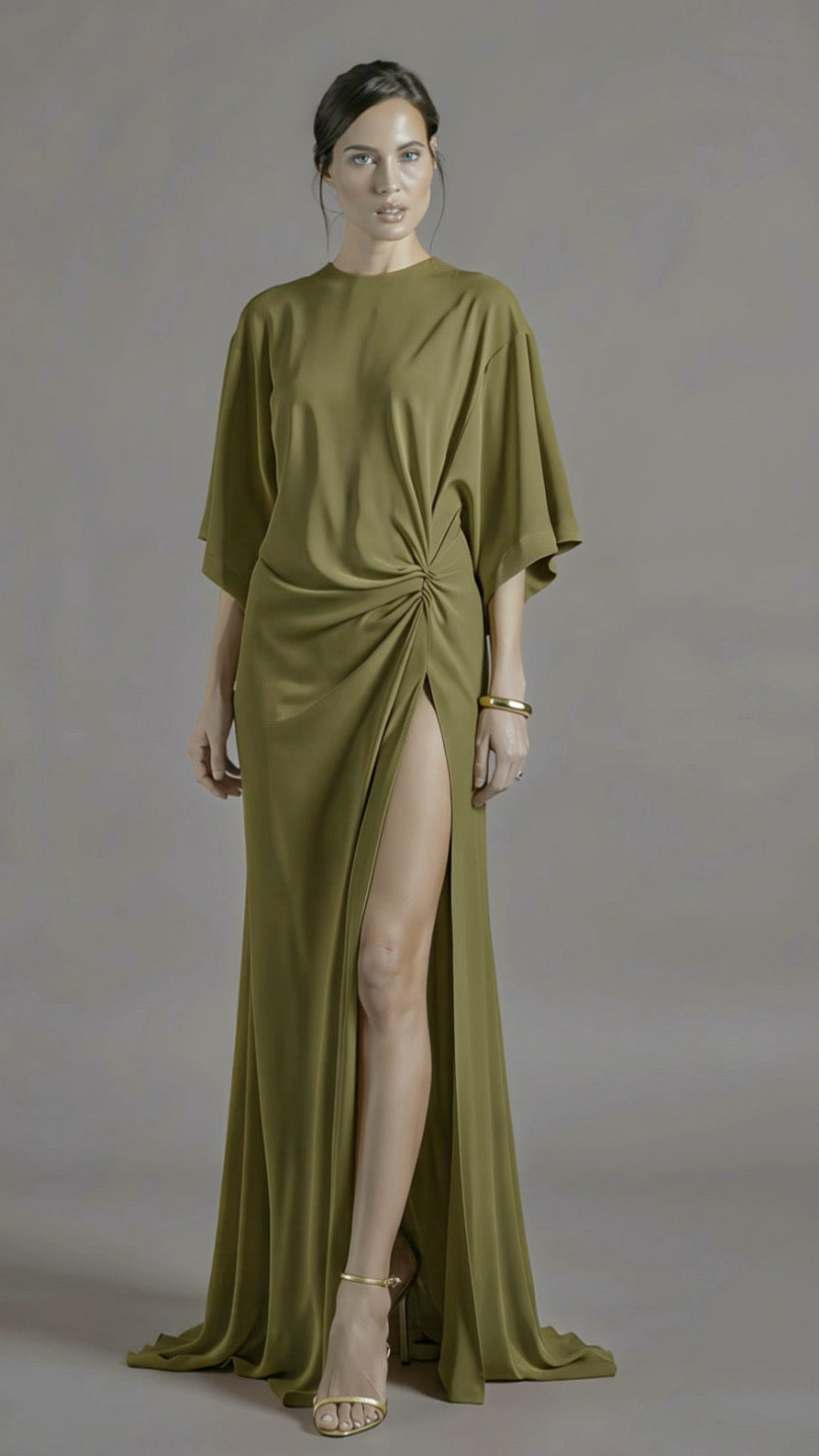 Petra Kara Minimal Ekati Draped Dress shown on a hanger, featuring elegant draped fabric and a sleek, minimalist design.