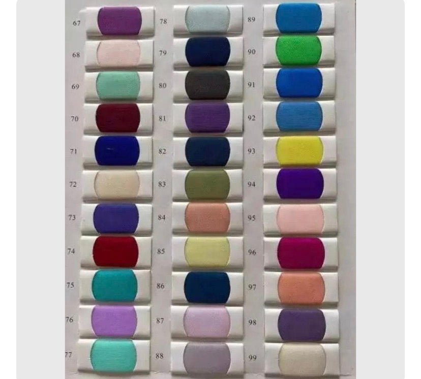 Demi black and ivory midi dress by PETRA KARA BRIDAL, featuring elegant fabric and a sophisticated design.