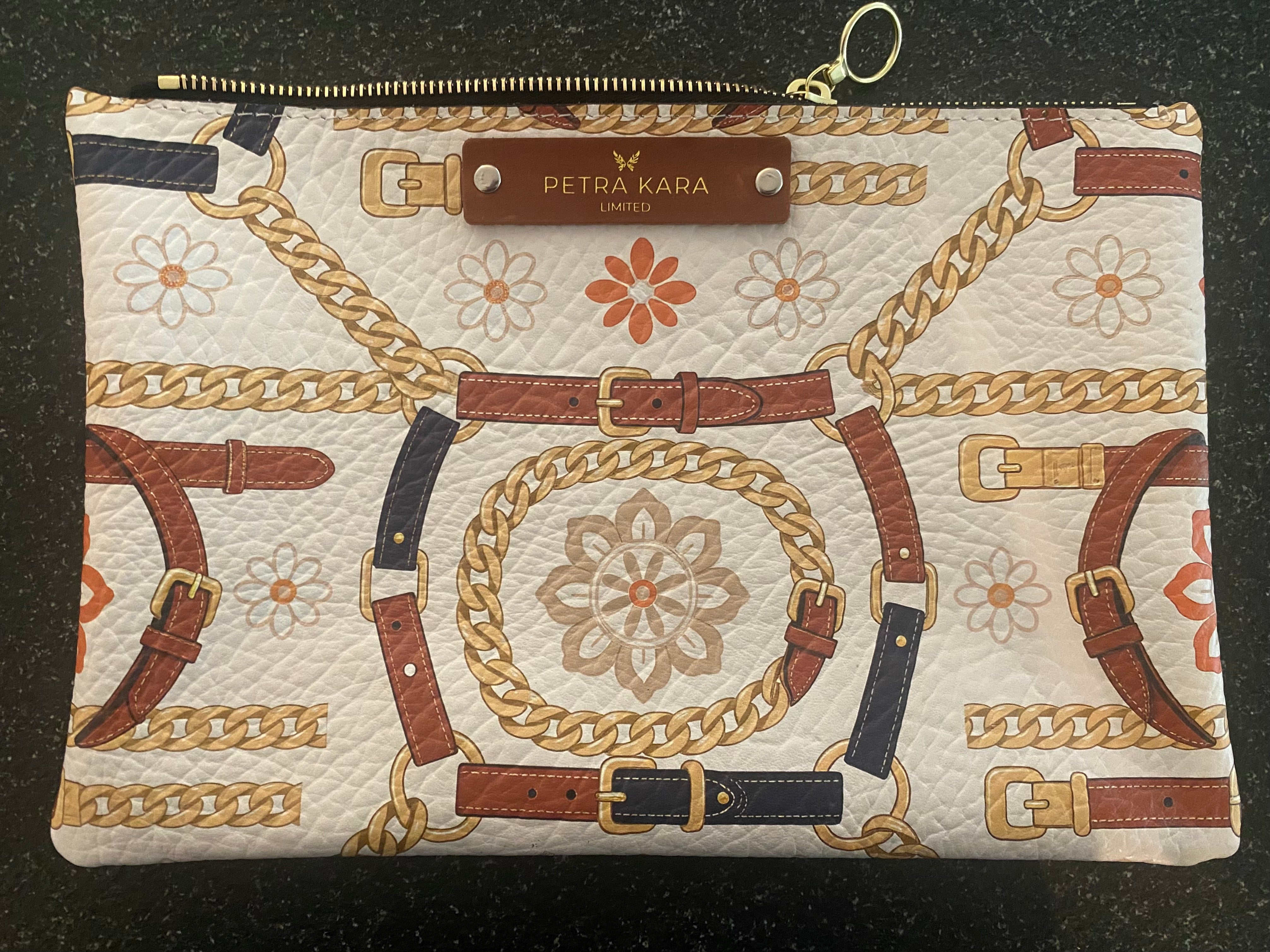 Leather purse from Petra Kara Limited's Revolution Collection featuring a sleek design and detailed craftsmanship.