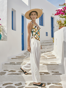 Petra Kara Limited swimsuit featuring chain details, vibrant colors, and a stylish fit perfect for beach or poolside fashion.