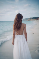 Ethereal boho beach dress by PETRA KARA BRIDAL featuring flowing fabric and relaxed fit, perfect for seaside or casual summer wear.
