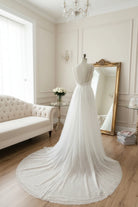 Boho wedding dress from the STARS collection by Atelier Calliste featuring flowing fabric and intricate lace details.