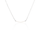PM Atelier Daphne Necklace with freshwater pearls and silver chain, elegant jewelry piece for sophisticated style.