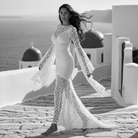 Petra Kara Bridal Cassandra boho wedding dress featuring lace details, flowing silhouette, and bohemian-inspired design.