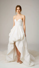 Screenshot of PETRA KARA's digital product for free virtual dress consultation, showing a stylish online service interface.