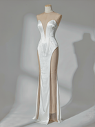 Petra Kara Aelia lace gown featuring intricate lace details and a flowing silhouette in elegant evening wear style.