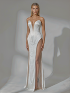Petra Kara Aelia lace gown displayed on a model, showcasing intricate lace details and elegant silhouette.